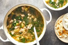 two white bowls filled with food next to each other