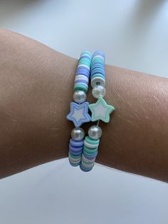 This bracelet is a cute summer friendship bracelet with blue and turquoise stars Trendy Handmade Turquoise Friendship Bracelets, Casual Light Blue Friendship Bracelets, Blue Beaded Star-shaped Bracelets, Playful Adjustable Blue Friendship Bracelets, Blue Beaded Bracelets With Star Charm For Gift, Cute Adjustable Turquoise Bracelets, Cute Blue Beaded Friendship Bracelets, Cute Adjustable Turquoise Beaded Bracelets, Blue Handmade Star-shaped Beaded Bracelets