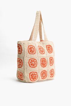 Multi-purpose crochet tote Comfortable double shoulder straps Metallic button closure Made in a durable fabric Fully lined interiors with zip pocket inside Size: 18" x 15" x 5" Embrace sunny days and seaside vibes with our Orange Crochet Beach Tote, the perfect companion for your next beach adventure or casual outing. Crafted with versatility in mind, this multi-purpose tote is as stylish as it is practical.Featuring comfortable double shoulder straps, this tote is designed for easy carrying, wh Orange Woven Crochet Bag For Vacation, Orange Summer Crochet Bag For Beach, Orange Crochet Summer Beach Bag, Orange Summer Crochet Beach Bag, Rectangular Cotton Straw Bag For Travel, Rectangular Cotton Straw Travel Bag, Cotton Crochet Travel Bag With Braided Handles, Travel Crochet Cotton Bag With Braided Handles, Cotton Crochet Bag With Braided Handles For Travel