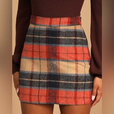 “From A High Banded Waist, Soft Woven Flannel Fabric In Rust Orange, Navy Blue, And Beige Plaid Descends Into A Mini, A-Line Silhouette. Exposed Brass Side Zipper/Clasp.” Nwt- Bought To Try On For Event, Didn’t Choose It But Missed Return Window. Size Medium, More Orange Than Red-Orange As Pictures Showed Online Fitted Orange Mini Skirt For Fall, Trendy Orange Skirt For Fall, Multicolor Fall Skirt, Fall Multicolor Skirt, Orange Casual Mini Skirt For Fall, Casual Orange Mini Skirt For Fall, Multicolor Mini Skirt For Fall, Orange Skirt For Fall, Orange Fall Skirt