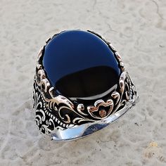 Men's onyx gemstone signet ring which will give you a head turning presence. This mystic, vintage style, engraved ring has a unique design for the polished, refined, and distinguished man. Perfect for casual and formal events, it will make your friends envious as you walk into the room full of confidence and pride. Looking for a unique, one of a kind GIFT FOR HIM, groomsman gift, father's day gift, teacher day gift? Look no further. This cool gemstone ring is the right answer and best gift for a Luxury Large Stone Rings For Men, Black Engraved Ring With Polished Finish For Formal Occasions, Formal Black Engraved Ring With Polished Finish, Black Oval Engraved Hallmarked Ring, Black Signet Ring With Polished Finish Gift, Formal Black Engraved Ring, Black Sterling Silver Engraved Ring For Wedding, Black Engraved Signet Ring For Wedding, Black Sterling Silver Engraved Wedding Ring