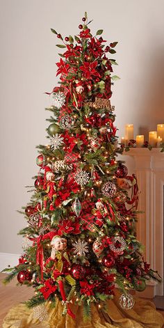 a christmas tree decorated with red and gold ornaments