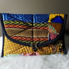 This Lovely African Print Handbag Will Make You Stand Out In The Crowd. Blue Fabric Bag With Removable Pouch, Casual Blue Bag With Laptop Sleeve, Blue Fabric Shoulder Bag, Fabric Clutch Bag For Everyday Use, Blue Rectangular Shoulder Bag With Laptop Sleeve, Blue Casual Clutch For Everyday Use, Casual Blue Clutch For Everyday Use, Blue Fabric Shoulder Bag For Travel, Casual Blue Clutch Bag