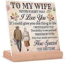 a wooden plaque with the words to my wife and an image of a woman walking