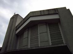 the top of a building with a clock on it