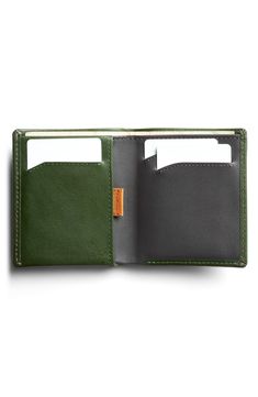 A well-organized interior ensures superior easy and convenience with this RFID-protected wallet. It has a smart pull-tab compartment so you don't have to dig for things, and its made from premium calfskin for lasting appeal. Interior currency pouch; pull-tab slip pocket; three card slots Leather Imported Functional Leather Wallet With Card Slots, Functional Leather Trifold Wallet For Daily Use, Functional Leather Trifold Wallet With Card Slots, Functional Trifold Wallet With Interior Card Slots, Functional Leather Card Holder With Rfid Blocking, Functional Trifold Wallet With Interior Card Slots For Everyday, Functional Leather Trifold Wallet, Green Trifold Wallet For Everyday Use, Functional Leather Bifold Card Holder