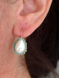 "Pearl and turquoise crystal drop earrings, white pearl halo teardrop earring, Bridal earrings, Bridesmaids gifts, Dangle earrings, gold Elegant and refined. They are made of gold plated brass and Swarovski crystals and acrylic pearls, all set in prong setting. Made with CRYSTALLIZED™ - Swarovski Elements Each teardrop is approx. 19 x 15 mm Total earrings' length is 30 mm (1.2 inch) AVAILABLE IN STUD VERSION AS WELL. JUST CHOOSE AT \"VERSION\" BOX. MATCHING NECKLACES ARE AVAILABLE. Please contac Elegant Turquoise Teardrop Earrings For Party, Turquoise Pearl Drop Earrings, Elegant Turquoise Drop Teardrop Earrings, Elegant Turquoise Pearl Drop Earrings, Elegant Turquoise Teardrop Earrings, Elegant Turquoise Teardrop Earrings As Gift, Pearl Halo, Earring Bridal, Pearl Cluster Earrings