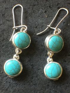 Real Turquoise,set in pure  silver bezel, good size gemstone 12mm diameter,stamped 925 ,nice weight and generous medium earwires but not to thick  0.9 gauge. only making one pair, will probley make a braclet as well to go with Earings, time will tell,interesting surface of Earings not actual cracks,smooth service,these gemstones are not currently in outlets,making them rare and not  produced in any number  also available to order with post and scroll attachements. .  .thank you for viewing only available on Etsy. Turquoise Dangle Earrings Stamped 925, Turquoise Round Sterling Silver Earrings, Nickel-free Turquoise Sterling Silver Earrings, Real Turquoise Jewelry, Time Will Tell, American Indian Jewelry, Real Turquoise, Dream Jewelry, Turquoise Jewelry