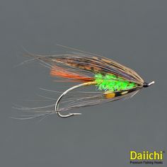 an orange and green fly flies through the air