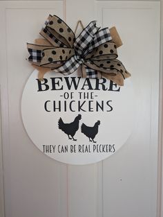 a sign that says beware of the chickens they can't be real pickers