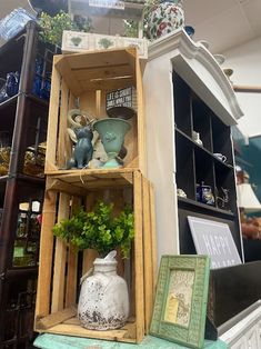 an assortment of vases and other items are on display in a room with shelves