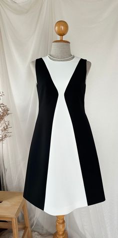 *DHL shipping upgrade is available at check out process. Shipping part by DHL will take 3-6 days only. Production time may take around 2-3 weeks. If this is in rush you can convo us to make it sooner.:) 🖤Queen Chess🖤 a dress from an inspiration. The combination of white and black is cool. The dress is simply elegant that you should include her to your closet. Will make you look stylish and chic in all occasions. Pear her nice with all style of your shoes and accessories to be very special day to night look good for all dress up and down. 💕  Also custom length for this dress is available please convo. DESIGN✄: -A line -Sleeveless  -Back zipper -Fully Lining -Longer length (requestable) please convo MATERIAL✄: *Amena fabric  (Polyester, bright color, not shining content, flattering one.) Mod Style A-line Party Dress, White A-line Mod Dress, Black A-line Dress For Summer, White A-line Mini Dress In Mod Style, White Mod Mini Length Dress, Black A-line Summer Dress, Retro Black A-line Mini Dress, Mod A-line Lined Dresses, Black Mod Mini Dress