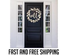 a black front door with the words fast and free shipping on it