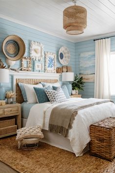 a bedroom with blue walls and wicker baskets on the headboard, bedding, and rugs