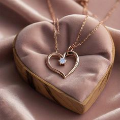 Add a touch of elegance to your jewelry collection with this stunning Rose Gold Moissanite Delicate Dainty Heart Locket Necklace. Featuring a finely crafted heart locket design, this delicate necklace is perfect for everyday wear or as a meaningful gift. The beautiful rose gold finish and sparkling moissanite stone add a luxurious feel, making it a must-have accessory. Whether you're looking for a timeless moissanite necklace, a dainty heart necklace, or a stylish rose gold piece, this heart loc Luxury Rose Gold Necklace For Valentine's Day, Fine Jewelry Heart Pendant For Wedding, Elegant Heart Charm Jewelry With Cubic Zirconia, Elegant Heart Charm Jewelry In Cubic Zirconia, Elegant Heart Charm Jewelry In Diamond White, Elegant Cubic Zirconia Jewelry With Heart Charm, Wedding Necklace With Heart Charm And Cubic Zirconia, Elegant Heart-shaped Cubic Zirconia Jewelry, Elegant Heart Shaped Cubic Zirconia Jewelry