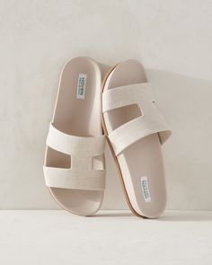 Step into summer ease. These chic sandal-slides go with just about everything. Slip them on to pad around on balmy days or to spend an afternoon on the patio. If you typically wear a half-size, size down for a more comfortable fit. Details + Design: Molded footbed. Material: 100% LinenImported | Linen Cutout Slides Haven Well Within Modern Classic Style, Chic Sandals, Natural Women, Womens Flats, Flat Sandals, Effortless Style, Ann Taylor, Slides, Shoes Sandals