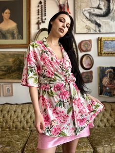 This one size Vintage Floral Robe is perfect for any occasion. Crafted from 100% polyester, this beautiful robe is designed to provide timeless style and lasting comfort. With it's floral pattern, this robe is sure to be eye-catching and stylish. One Size (fits S/M) This is a preloved item. Spring V-neck Sleep Robe, Spring Feminine Robe With Kimono Sleeves, Feminine V-neck Robe For Daywear, Feminine Floral Print Robe For Loungewear, Floral Print Sleepwear With Kimono Sleeves, Floral Print Kimono Sleeves Sleep Robe, Spring V-neck Robe For Loungewear, Floral Print V-neck Dress For Pajama Party, Summer Floral Print Sleep Kimono