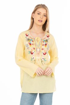 Featured on a lemon yellow background, this boho style blouse is made from 100% natural cotton voile fabric with drawstrings. It also features floral embroidery on the yoke and collar.Model is 5’8” - wearing size small. Model Bust: 34”Hand-wash cold, lay flat to dry.Made in India. Yellow Floral Embroidery Blouse For Vacation, Spring Vacation Blouse With Tassel Ties, Yellow Floral Embroidery Tops For Vacation, Yellow Floral Embroidered Blouse For Spring, Yellow Blouse With Floral Embroidery For Spring, Casual Embroidered Top With Boho Collar For Spring, Yellow Embroidered Blouse For Beach, Spring Peasant Blouse With Tassel Ties, Spring Cotton Blouse With Embroidered Neckline