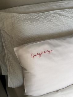 a white pillow with the words congratulations on it