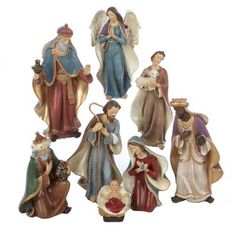 six nativity figurines in different colors and sizes