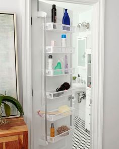 a white refrigerator freezer sitting inside of a kitchen