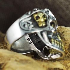 True to its name, this 925 silver skull and crossbones ring breathes a feeling of power into its wearer and attracts the attention of the public. every element of this piece is deliberately bold, you'll love it. Welcome fans of mythology I know the name and the design of this ring attracted you. usually, when we think of the god of the sun in the old Mexican culture we think of Tonatiuh the god personifying the sun, the Aztecs considered him the ruler of Tullan, he was also known as the fifth su Sterling Silver Skull Ring In White Gold, Gothic Skull Ring Stamped 925, Silver Spiritual Skull Ring For Anniversary, Silver Symbolic Skull Ring For Halloween, Symbolic Silver Skull Ring For Halloween, Sterling Silver Skull Ring With Engraving, Sterling Silver Engraved Skull Ring, Sterling Silver Skull Ring Engraved, Silver Skull-shaped Engraved Rings