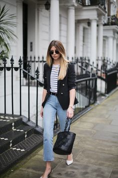 Stripe t-shirt, black military blazer, light wash high waisted jeans, black belt, round rayon sunglasses, black bucket bag, white kitten heel sing backs, spring outfit Emma Hill, Capsule Dressing, Military Blazer, T Shirt Branca, It Bag, Casual Chique, Style Trends, Blazer Outfits, French Girl