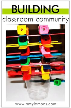 an image of a classroom community poster with the words building on it and colorful magnets in