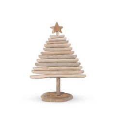 a small wooden christmas tree with a star on top