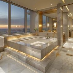 a bathroom with a large bathtub in the middle of it's floor to ceiling windows