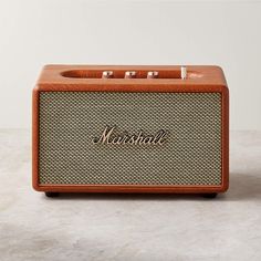 a wooden radio with the word marshall on it