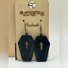 **Handmade Laser Cut Wood Earrings By Kb Artcrafts** - **Design**: Coffin Shape With A Cross Cutout - **Material**: Wood - **Size**: 1.5 Inches In Height, 1 Inch Across - **Earring Type**: Fish Hook Pierced - **Craftsmanship**: Handmade In Abilene, Texas These Unique Earrings Offer A Bold And Edgy Style, Perfect For Adding A Distinctive Touch To Your Look! Cross Cutout, Abilene Texas, Laser Cut Wood Earrings, Coffin Shape, Edgy Style, Wood Sizes, Laser Cut Wood, Wood Earrings, Earring Type