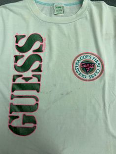 "Vintage 80s Guess New York Surfing Style Spell Out Logo T Shirt / Hip Hop 90s / 90s Streetwear T Shirt Made In Usa Size M Condition : Good Used Size on tag : M Colour : Greenish Brand : guess Measurement : Armpit to armpit -21\" Length - 24\" Material : Old Cotton Made In: USA THE SHIPPING (Your Choice Please read) 1. The shipping cost is USD 20 via Malaysian Registered Postage With Tracking Number. It will take 2-4 weeks or more for delivery, depends on your custom checking. 2. Add USD 10 for Vintage Logo Print Tops For Spring, Vintage Logo Print Summer Tops, 90s Green Letter Print Tops, 90s Green Tops With Letter Print, Vintage Summer Tops With Logo Print, Vintage Crew Neck Top With Logo Print, 90s Style Green T-shirt For Spring, 90s Style Green Screen Print Top, Retro Green Top With Letter Print