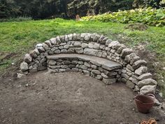 a stone bench built into the side of a hill