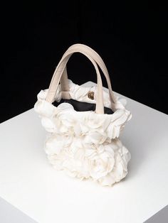 This Romantic Rose Handbag is the perfect accessory for any special occasion. Its elegant and timeless design is perfect for weddings, parties, and Valentine's Day gifts. The delicate rose detailing adds a romantic touch, making it a great gift for your loved one. Elevate your style with this exquisite handbag. Color : Apricot Details : Ruffle Type : Bucket Bag Bag Size : Mini Strap Type : Double Handle Pattern Type : Plain, Plants, Random Print Closure Type : Magnet Features : Lightweight Compo White Bags For Valentine's Day Party, Chic Bags For Valentine's Day Event, Elegant Handheld Shoulder Bag For Valentine's Day, Feminine Cream Bags For Wedding, White Party Bags For Valentine's Day, Feminine Cream Wedding Bags, Feminine White Bag For Party, Feminine White Party Bag, Feminine Beige Wedding Bags