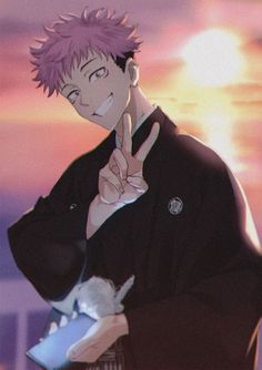 a man with pink hair making the peace sign in front of an orange and purple sky