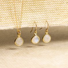 "Moonstone Necklace and Drop Earrings Matching Set - Delicate, Dainty, minimalist, simple gold jewelry gift for wife, girlfriend, daughter This listing is for a SET and includes both a pair of earrings and necklace. Gemstones: Rainbow Moonstone Bezel: Vermeil Gold (14k Gold over Sterling Silver) Note that due to the handmade nature of these genuine stones, measurements/color are approximately and might vary slightly for each stone. Necklace: Drop Gemstone: 11mm x 9mm Gold chain: 14k gold filled Gold Moonstone Jewelry With Delicate Chain, Delicate Moonstone Gold Jewelry, Delicate Gold Moonstone Jewelry, Minimalist Teardrop Earrings With Matching Jewelry, Dainty Gold Moonstone Jewelry, Gold Minimalist Moonstone Jewelry, Minimalist Birthstone Earrings, Gold Gemstone Jewelry Set For Gift, Everyday Gold Moonstone Jewelry