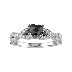 a heart shaped black and white diamond ring