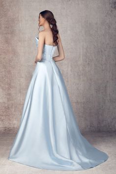 Looking for a dress that will make you feel like royalty? Look no further than the Ziad Germanos WA0116. This gorgeous gown features a rich blue hue and intricate tulle detailing. It's sure to make you stand out at any event!