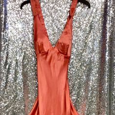 Coral Gown Glamorous Silk V-neck Gown, Spring Party Evening Dress With Bias Cut, Fitted Bias-cut Gown For Spring, Fitted Satin Gown For Spring, Fitted Satin Spring Gown, V-neck Gown With Bias Cut For Party, Silk Gown For Spring Party, Spring Party Silk Gown, Silk V-neck Gown For Party