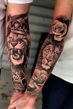 two people holding hands with tattoos on their arms and one has a lion, rose and crown