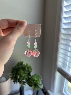 These are adorable, handmade peach earrings. Sweet Pink Drop Earrings, Whimsical Pink Nickel-free Earrings, Sweet Pink Dangle Jewelry, Whimsical Nickel-free Pink Earrings, Handmade Trendy Pink Flower Earrings, Cute Nickel-free Flower Earrings, Whimsical Handmade Pink Earrings, Whimsical Pink Handmade Earrings, Cute Pink Flower Earrings With Ear Wire