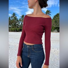 Fitted Off-The-Shoulder Long Sleeve Shirt In Ribbed Cotton. Fabrics: 100% Cotton Measurements: 14" (36 Cm) Length, 12" (30 Cm) Bust Made In: Europe Winter Fitted Off-shoulder Tops, Fitted Off-shoulder Winter Tops, Fitted Burgundy Winter Top, Casual Red Off-shoulder Top, Fall Season Red Off-shoulder Tops, Cropped Off-shoulder Top For Fall, Red Off-shoulder Tops For Fall, Winter Off-shoulder Fitted Crop Top, Fall Off-shoulder Red Tops