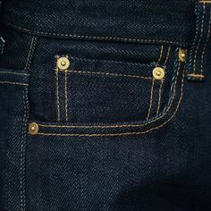 Crafted from 23oz heavyweight selvedge denim, our 2023 Autumn Collection's Back Cinch Selvedge Jeans are the epitome of chic summer vogue. Enjoy a mid-waist fit, stylish zipper and button closure, and a unique back cinch design, all crafted from the finest quality materials. Be the envy of your friends with this timelessly cool denim ensemble!Distinctive Features: Raw, Straight 23oz Selvedge: Enjoy the perfect shape and stylish look of raw, straight selvedge denim with a 23oz heavyweight fabric Indigo Selvedge Bottoms For Streetwear, Indigo Selvedge Rigid Denim Bottoms, Selvedge Rigid Denim Bottoms For Streetwear, Summer Vogue, Cinch Jeans, Cool Denim, Blue Crafts, Selvedge Denim, Dark Blue Color