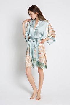 This short silk kimono robe is a luxurious, handcrafted piece of art you can wear. Removable waist tie closure Belt loops and inside ties to secure closure French seam finish Side slits at hem 100% Silk, Dry clean Designed in San Francisco, Imported KM04S Every day is a little more beautiful in this luxurious, breathably soft, one of a kind watercolor robe. Each piece features an original pattern — first sketched by hand, then saturated in rich watercolors using a traditional paintbrush — so jus Silk Robe Short, Feather Kimono, Short Kimono Robe, Robes For Women, Kimono Robes, Silk Kimono Robe, Beautiful Kimonos, Short Kimono, Silk Robe