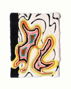 an abstract rug with black, white, and yellow designs on it's edges