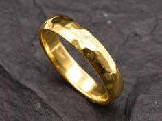 Gold Hammered Ring made of Gold Vermeil: 18k Gold over Solid 925 Sterling Silver ☞ made to last.Matching Pendant & Matching Earrings ☞ please ask me Details:• Gold Wedding Band • Dimensions: Band width ≈ 3.5mm, thickness ≈ 1.6mm• 18k Gold Vermeil SKU TE-019 Elegant Hammered Yellow Gold Wedding Jewelry, Yellow Gold Hammered Wedding Ring, Hammered 22k Gold Wedding Jewelry, Hammered 14k Gold Wedding Rings, 14k Gold Hammered Wedding Rings, Wedding Rings In Hallmarked Recycled Gold, Gold Hammered Stackable Wedding Rings, Hammered 22k Gold Jewelry For Anniversary, Gold Hammered Stackable Rings For Wedding