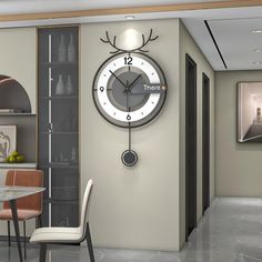 there is a clock on the wall in the dining room