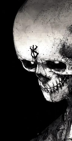 a black and white photo of a skull with stars on its forehead