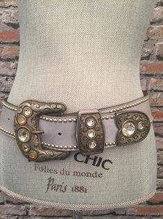 "Beautiful 2\" Wide pearl grey leather belt, studded with a large stone encrusted buckle. Eight adjustable holes ranging from 27\"-33\". From Santa Monica California . In excellent condition" Love Pink Wallpaper, Hip Belt, Santa Monica California, Large Stone, Wool Shirt, From Santa, Suspender Belt, Pearl Grey, Pink Wallpaper